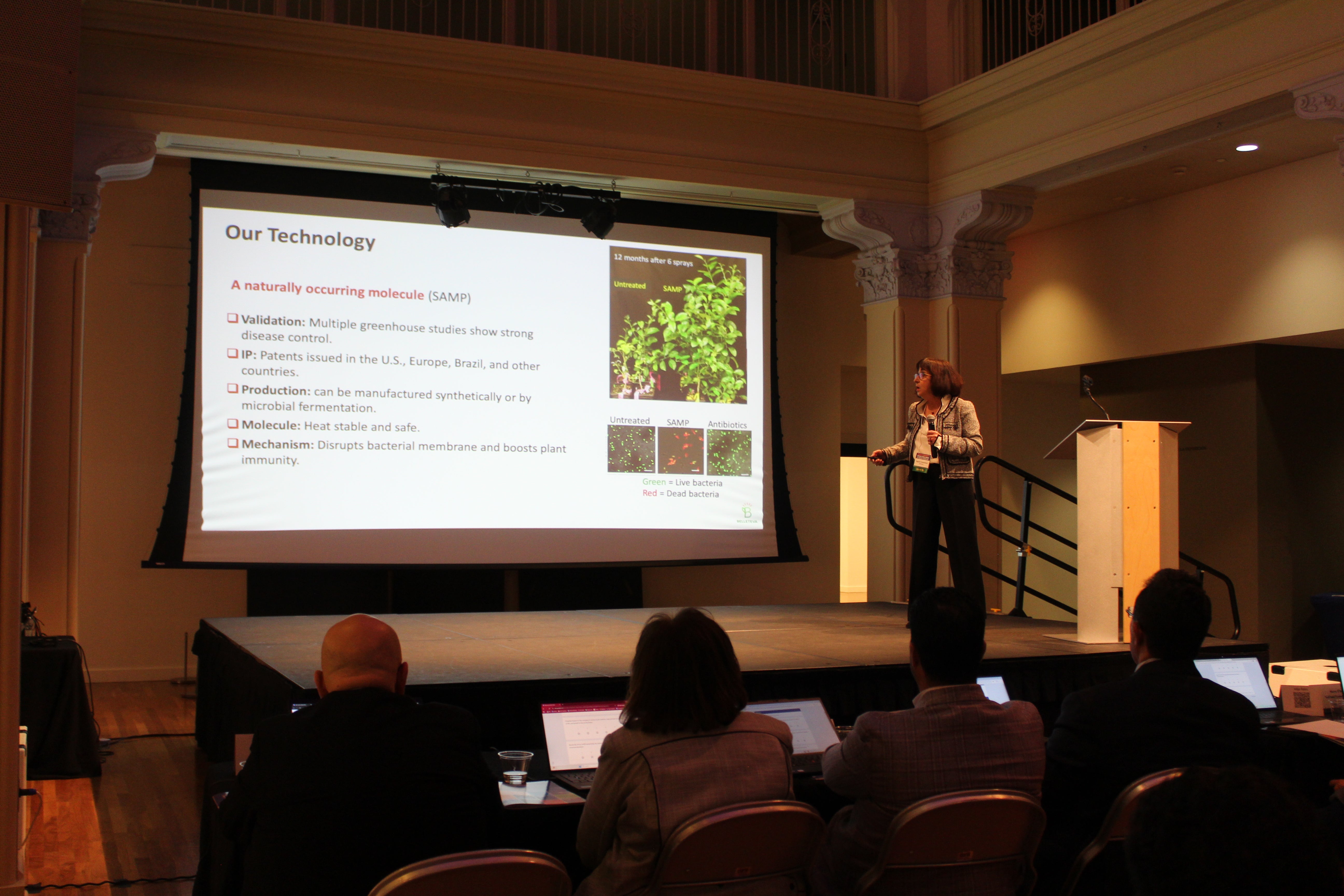 CEO of Belleteva pitching onstage at the 2025 SoCal OASIS Pitch Challenge Finals.