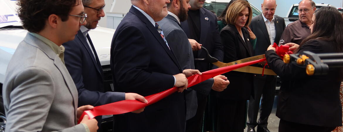 Voltu CEO George Gebhart cutting the ribbon alongside Riverside Mayor Patricia Lock-Dawson during the ribbon cutting ceremony at Voltu's new Riverside facility.