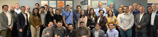 A picture of a group of entrepreneurs and innovators at the ExCITE Incubator, all smiling for the camera.