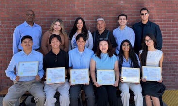 Laundry to Landscapes CEO Andrea Cuellar (back row, center) and co-founder Miguel Cuellar (back row, third from right) hosted an appreciation luncheon recognizing the UCR engineering capstone team, where students were presented with a Special Mayoral Recognition from the City of Moreno Valley. They were joined by UCR's Entrepreneur-in-Residence and business mentor Galen Williams (back row, left) and community partners to celebrate the students' contributions and connect them with professionals in fields ali